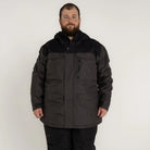 Man wearing a gray and black insulated winter parka from Snow Country Outerwear Men’s Big Sizes