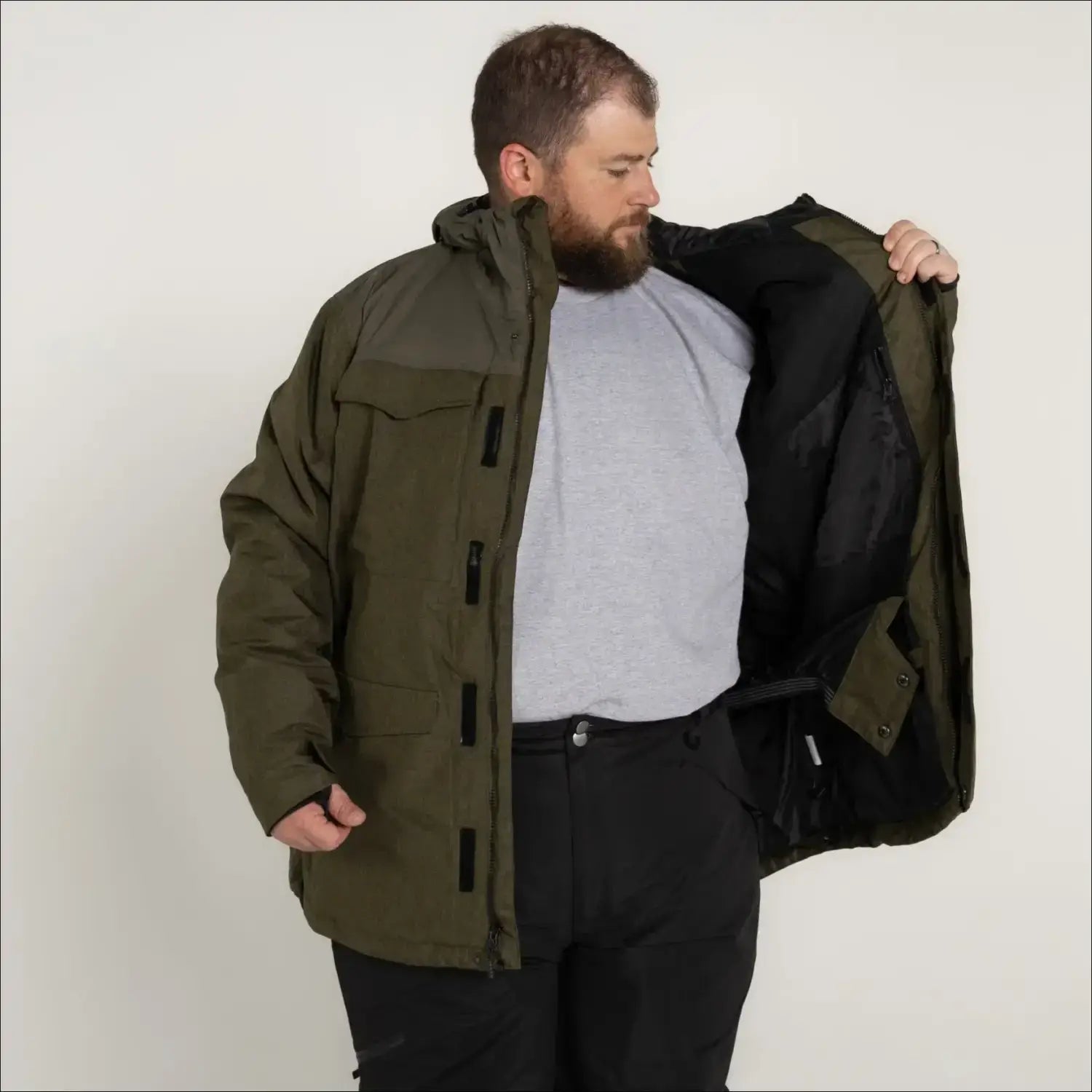 Olive green winter jacket for men from Snow Country Outerwear ideal for skiing and snowboarding