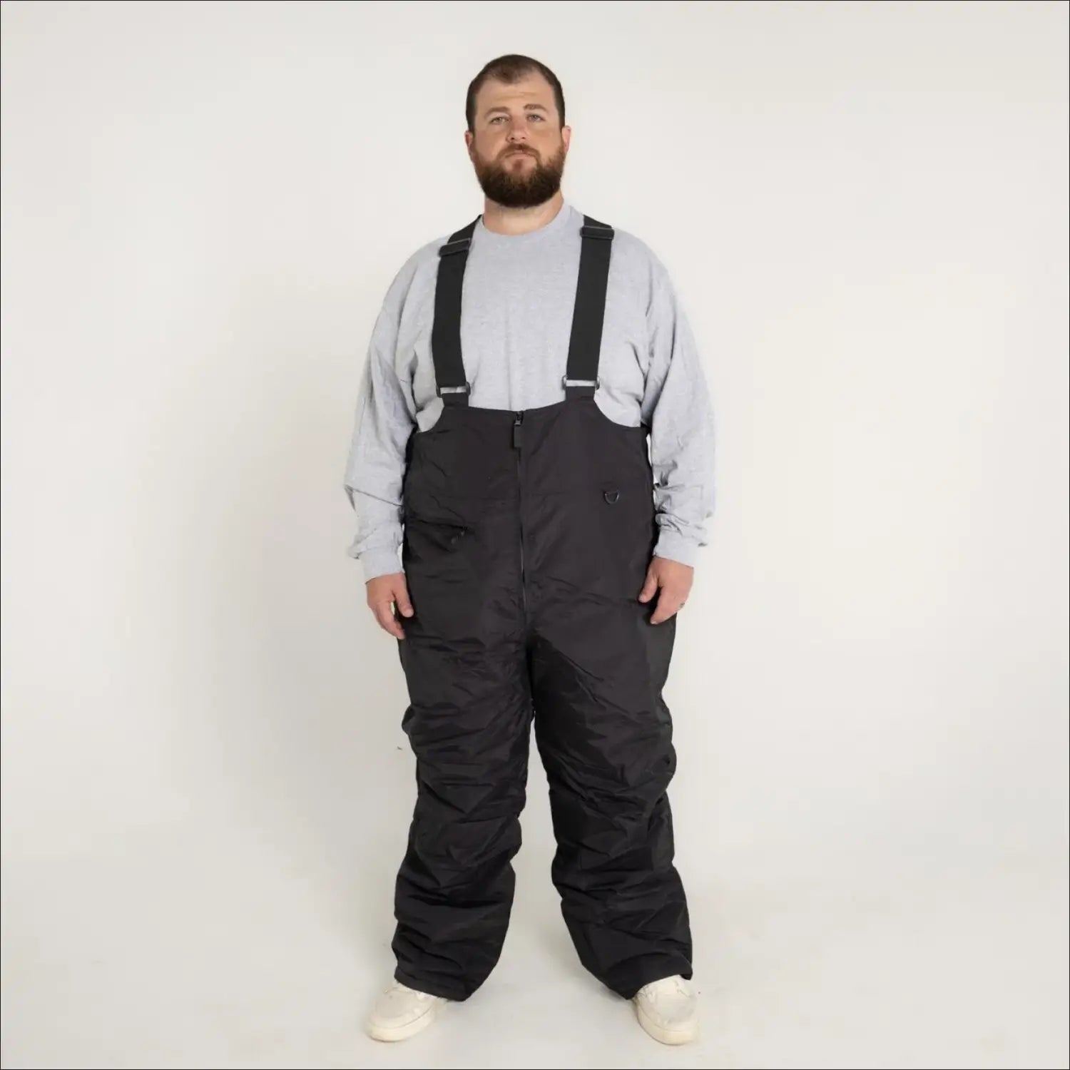 Black snow pants with suspenders from Snow Country Outerwear Mens Ski Bibs