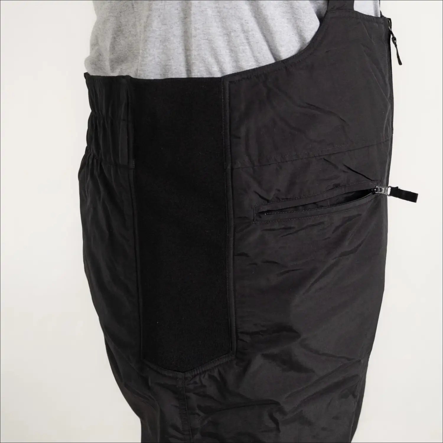 Black snow bib overalls for men from Snow Country Outerwear, insulated ski suspender pants