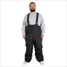 Man wearing black Snow Country Outerwear insulated ski snow bibs with suspenders
