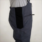 Gray bib overalls with a black panel from Snow Country Outerwear Men’s Insulated Ski Snow Bibs