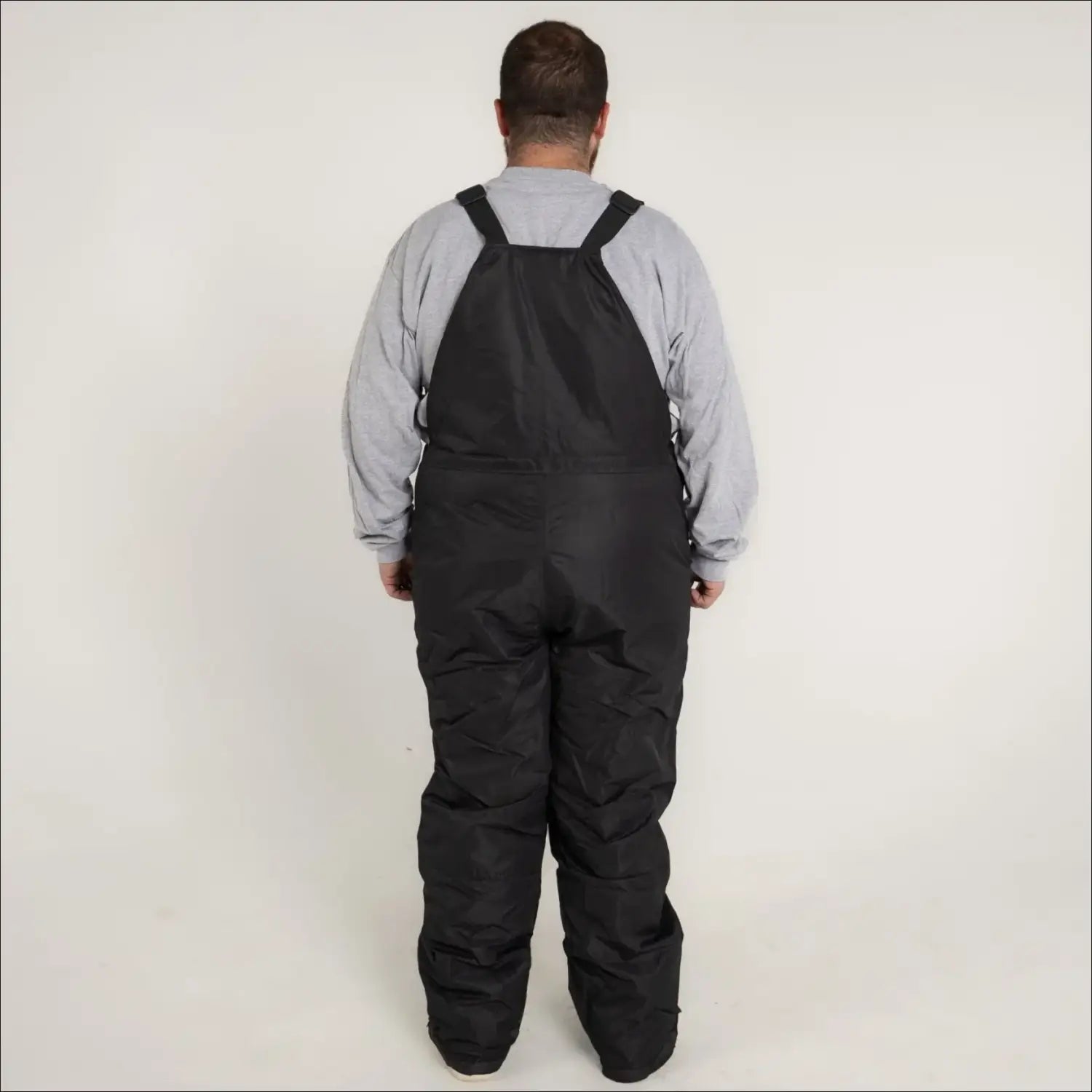 Black insulated bib overalls for skiing from Snow Country Outerwear in big and tall sizes