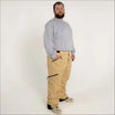 Man wearing tan Snow Country insulated winter ski snow pants for men