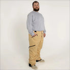 Man wearing tan Snow Country insulated winter ski snow pants for men