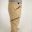 Tan insulated snow pants with zippered pockets from Snow Country Outerwear for skiing