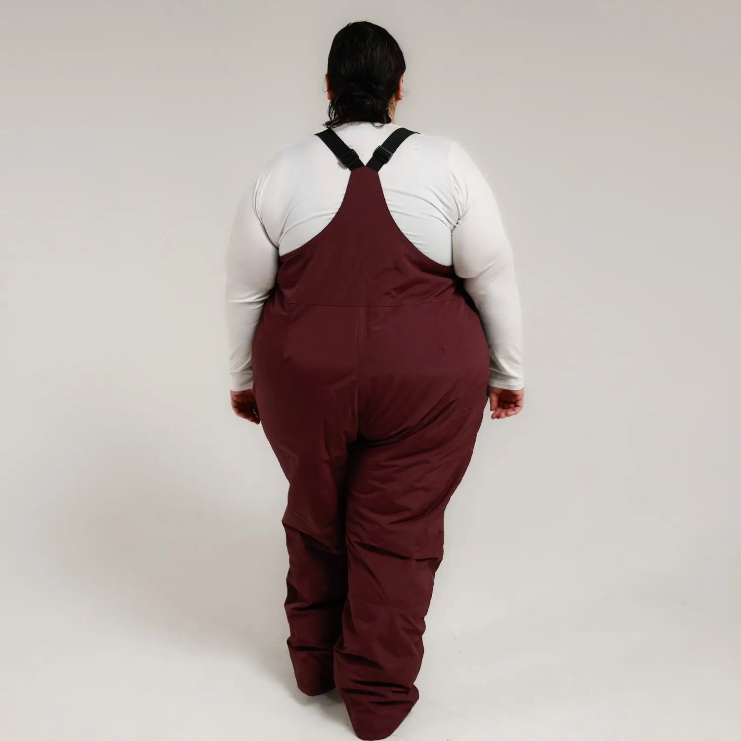 Maroon ski bib overalls from Snow Country Outerwear Women’s Plus Size Vertex collection
