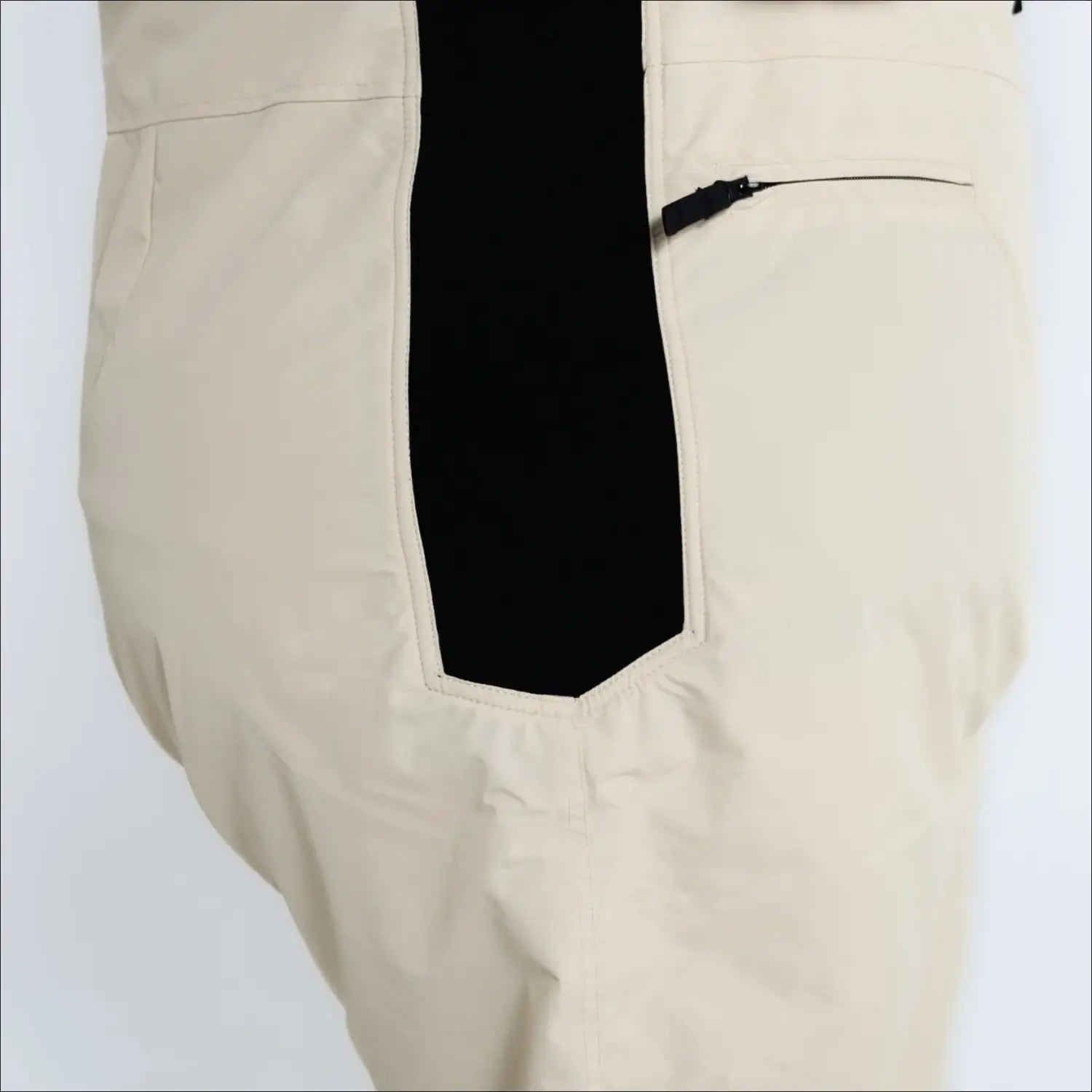 Beige pants with black accent from Snow Country Outerwear Women’s Plus Size Ski Bibs