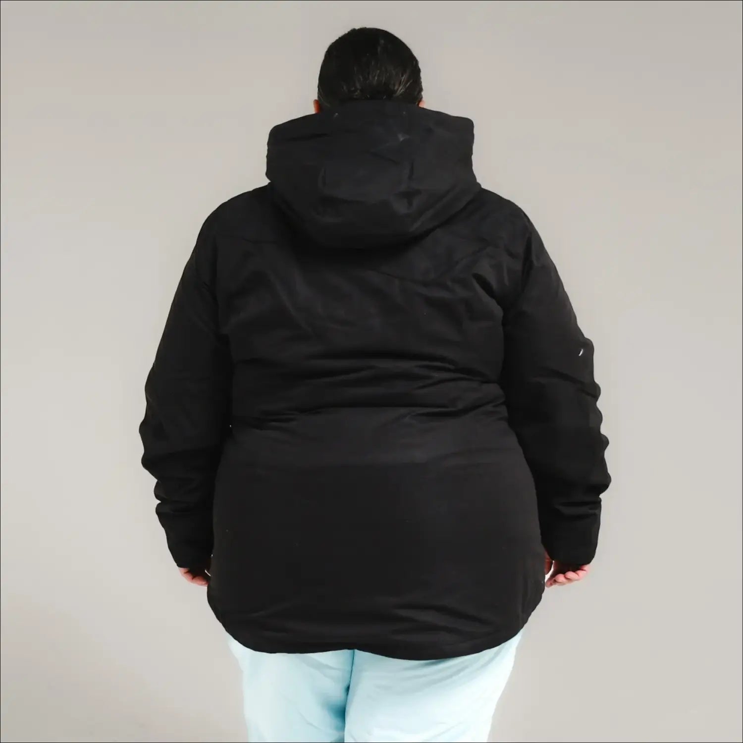 Black hooded winter coat from Snow Country Outerwear Women’s Plus Size Uptown Ski Jacket
