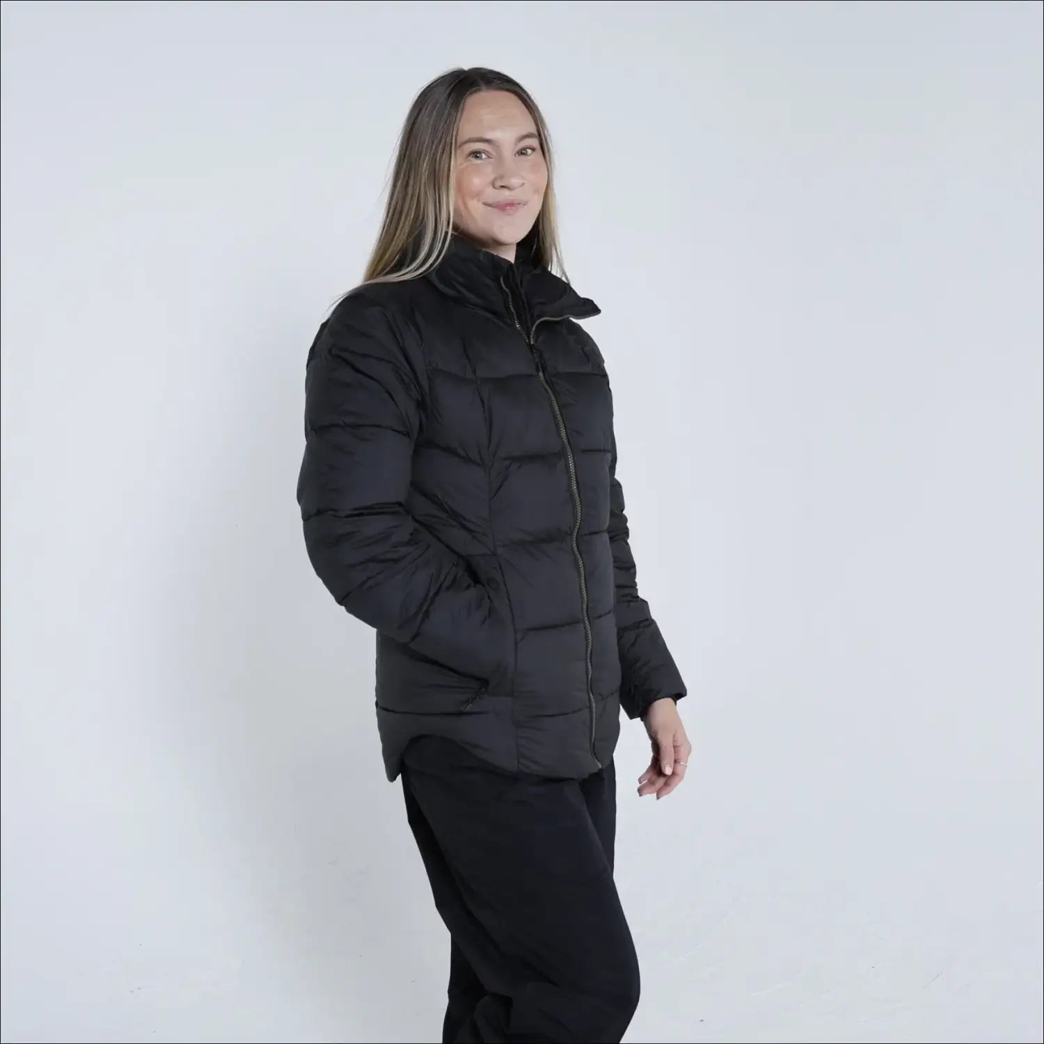 Black puffer jacket from Snow Country Outerwear Women’s Lexington Puffy Synthetic Down Jacket