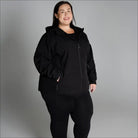Woman in black hooded fleece jacket and leggings, plus size spring fall outerwear