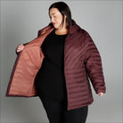 Burgundy quilted puffer jacket displayed in Women’s Plus Size Packable Down Coat Outerwear