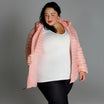 Woman in pink puffer jacket showcasing Women’s 1X-6X Plus Packable Down Coat Outerwear