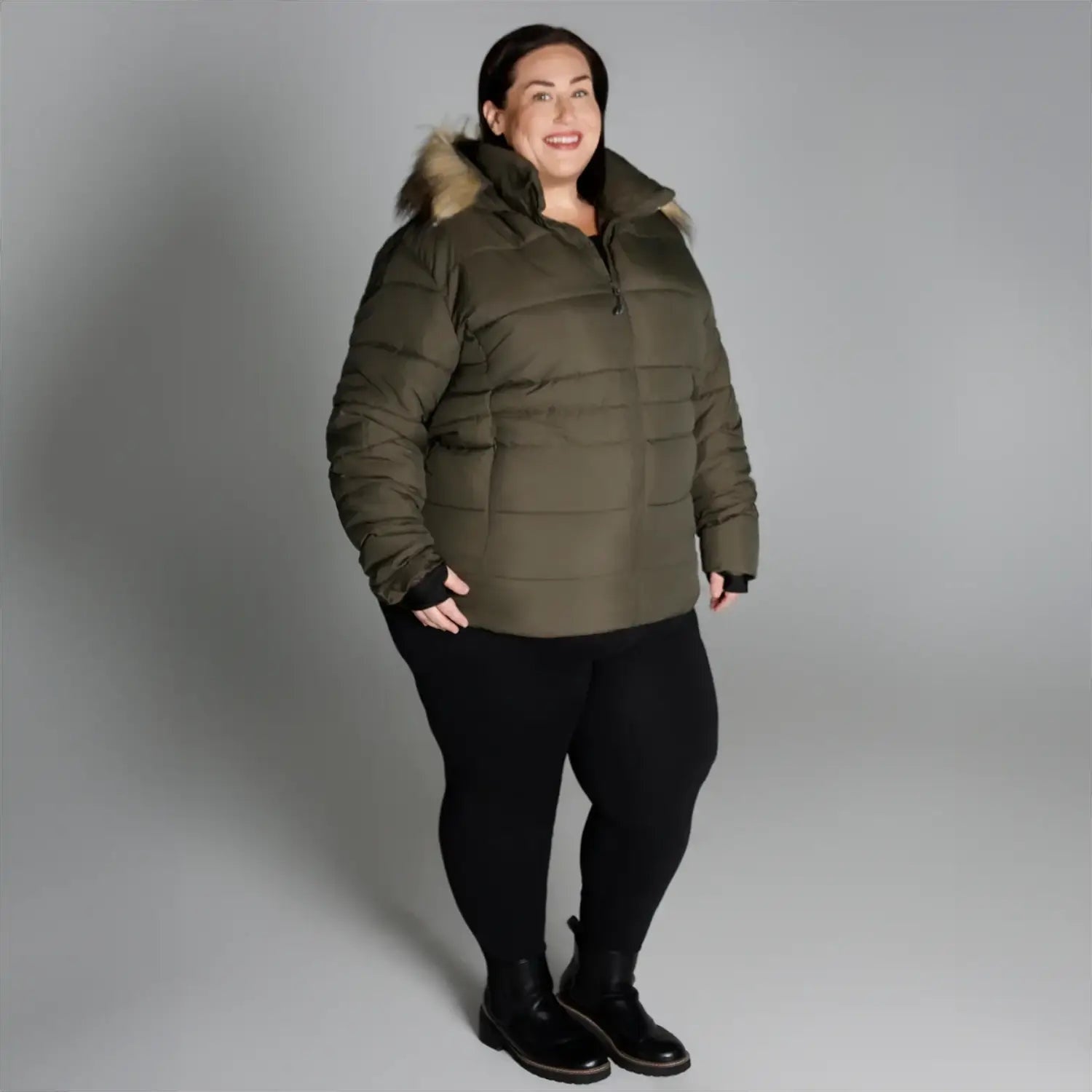 Olive green puffer jacket with fur trim from Snow Country Outerwear for plus size women