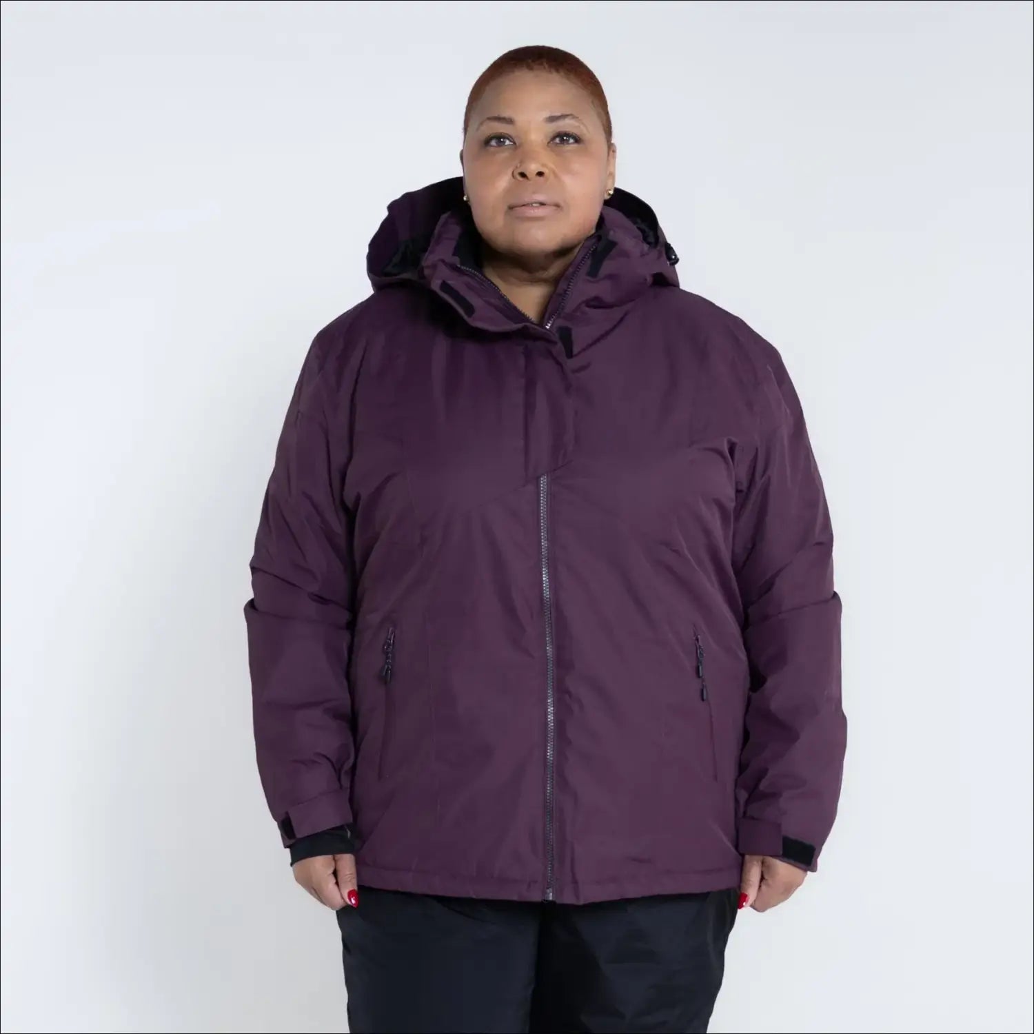 Plum-colored hooded winter jacket from Snow Country Outerwear Women’s Plus Size Ski Coat