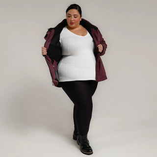 Burgundy jacket with black leggings and boots from Snow Country Outerwear Plus Size Ski Coat