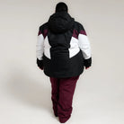 Person wearing a black, white, and burgundy Snow Country Women’s Plus Size Ski Jacket