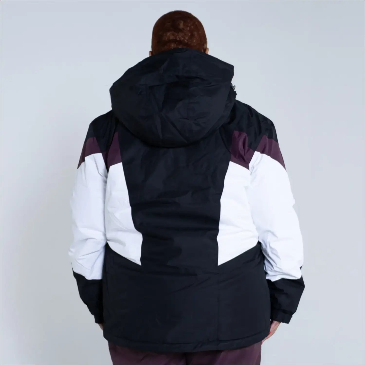 Black, white, and burgundy hooded winter jacket from Snow Country Outerwear for women