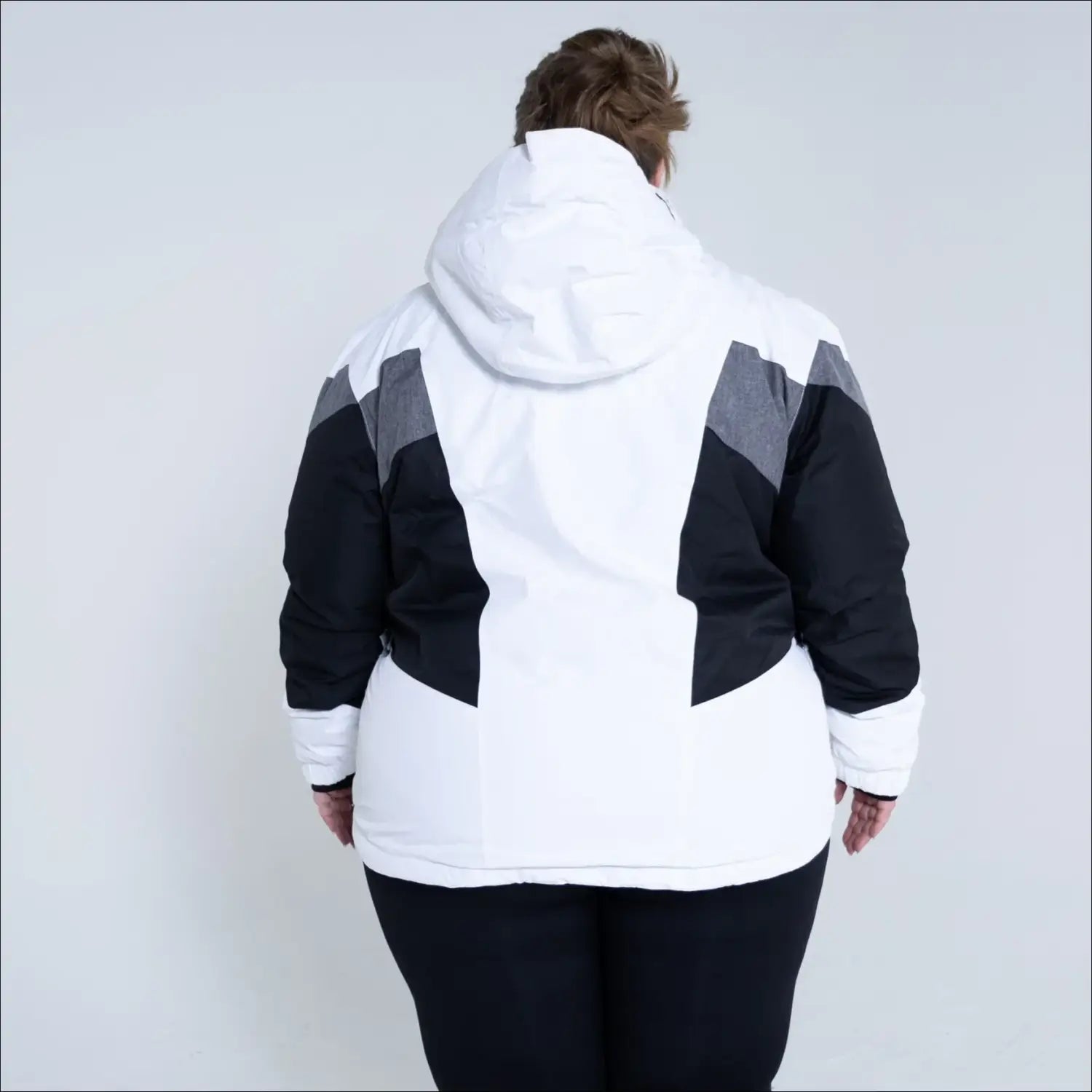 White black and gray hooded winter jacket from Snow Country Outerwear Plus Size Ski collection