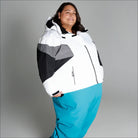 White, black, and gray hooded winter jacket with blue pants from Snow Country Outerwear