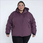Plum-colored hooded puffer jacket from Snow Country Outerwear Women’s Plus Size Fortress Winter Snow Ski Coat
