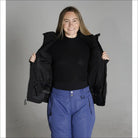 Woman wearing Snow Country Outerwear Vail Down Alternative Winter Ski Jacket