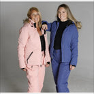 Two women wearing Snow Country Outerwear Womens Vail Down Alternative Winter Ski Jackets