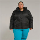 Black puffer jacket with blue pants from Snow Country Outerwear Womens Aspen Ski Coat