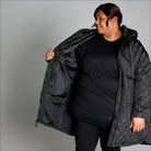 Plus size black quilted puffer coat for women in Long Transitional jacket style