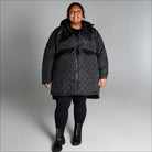 Black quilted puffer coat for women in plus size with long transitional style
