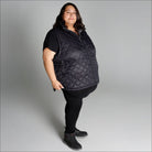 Plus size black quilted insulated vest for women in Savvy Outerwear collection