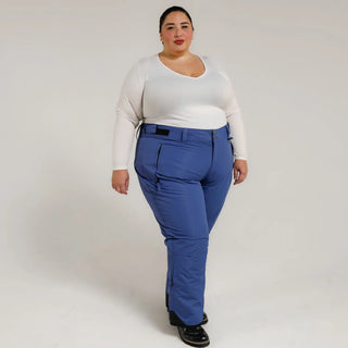 Woman wearing blue Snow Country insulated plus size ski pants for women