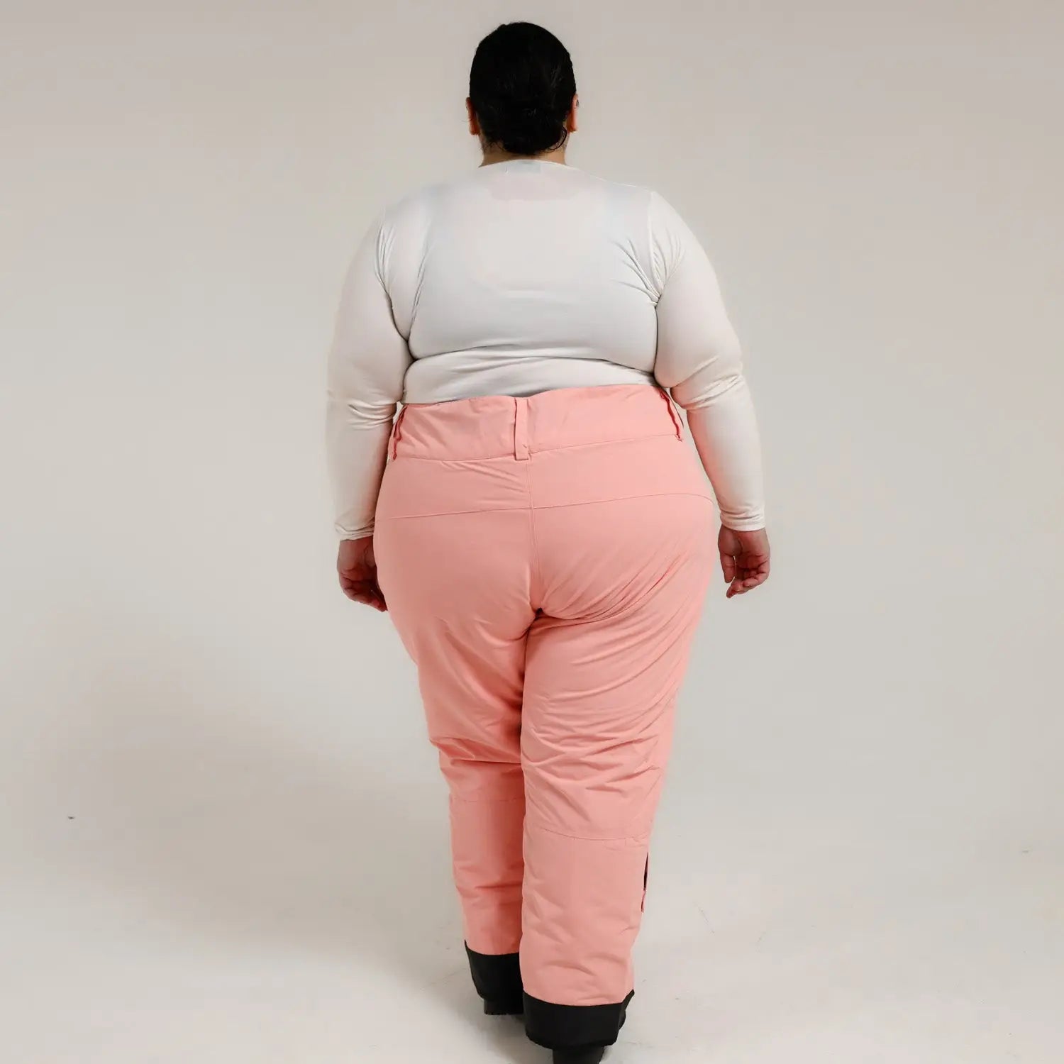 Peach-colored snow pants from Snow Country Outerwear for women in plus size ski gear