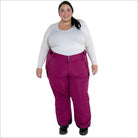 Woman wearing magenta Snow Country insulated ski snow pants for women Plus Size