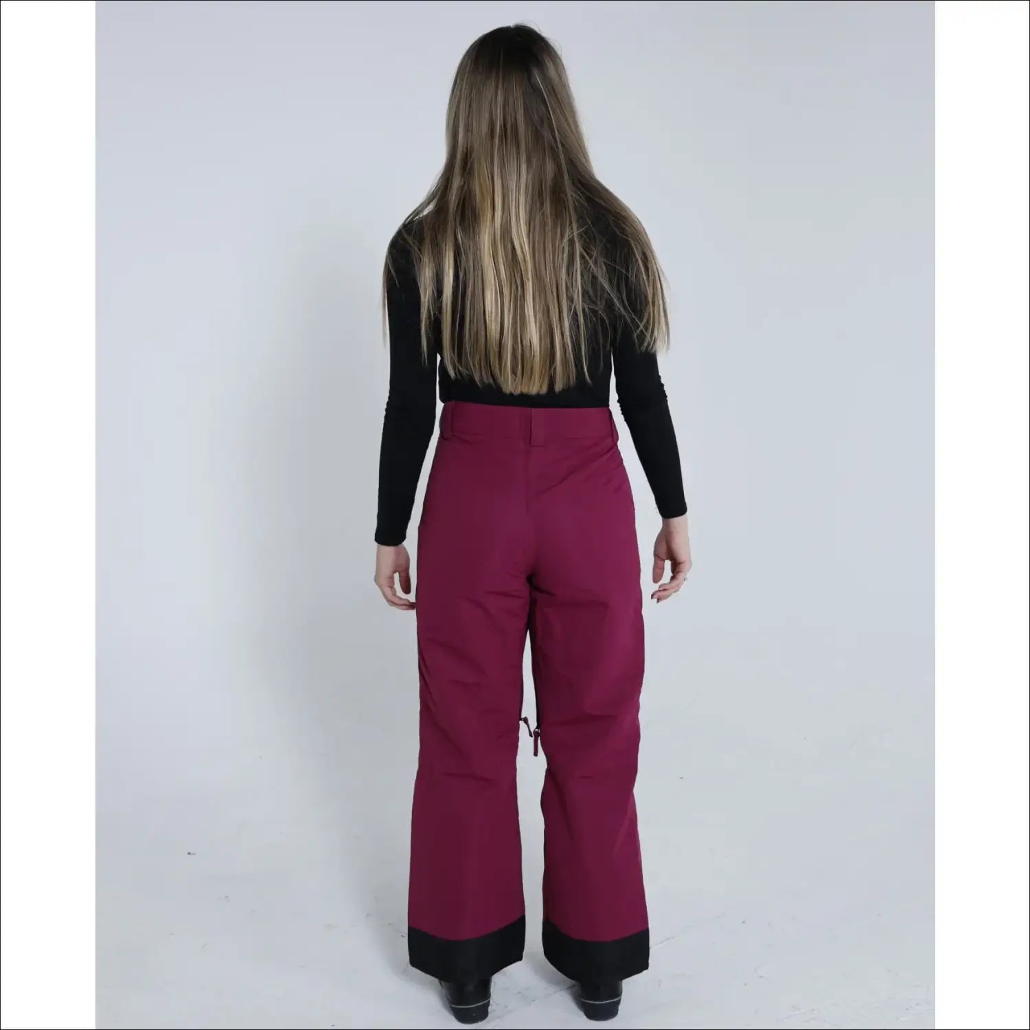 Maroon ski pants with black cuffs from Snow Country Outerwear for women in insulated S-XL