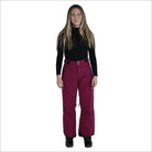 Woman wearing maroon Snow Country Outerwear women’s ski pants for snowboarding