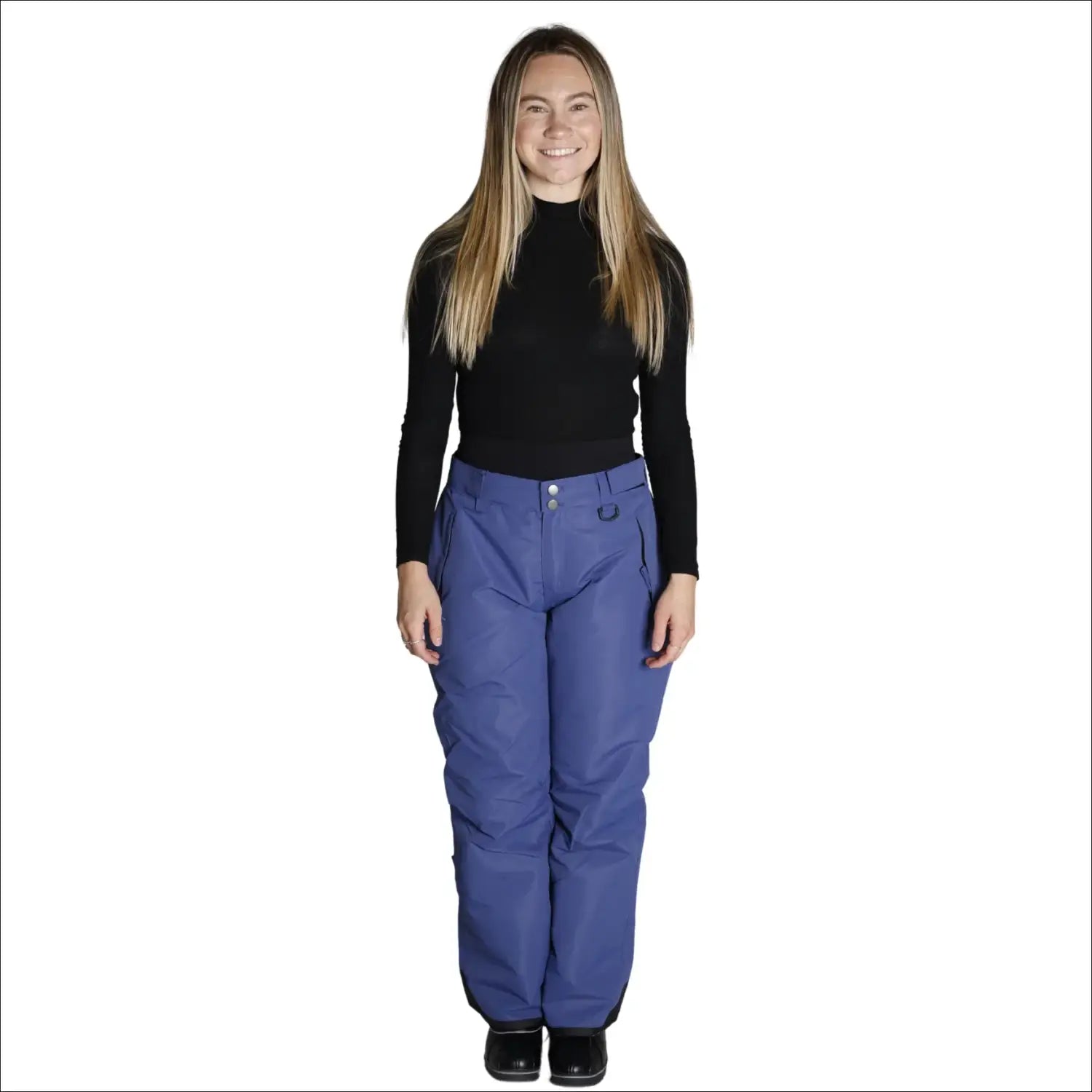 Woman wearing blue Snow Country Outerwear insulated ski pants ideal for snowboarding