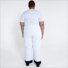 White ski pants with black cuffs from Snow Country Outerwear women’s plus size insulated ski pants