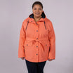 Woman wearing an orange belted trench coat from Snow Country Outerwear Rain Jacket collection