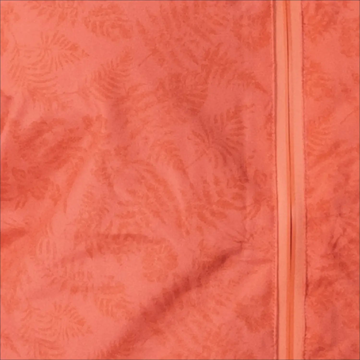 Peach-colored fabric with fern pattern and zipper on Women’s Plus Size Rain Jacket