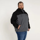 Man wearing Snow Country Outerwear 3X-7X Men’s Big Rain Jacket Windbreaker Packable