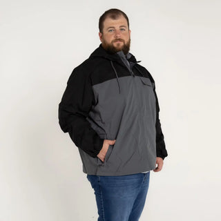 Man wearing Snow Country Outerwear 3X-7X Men’s Big Rain Jacket Windbreaker Packable