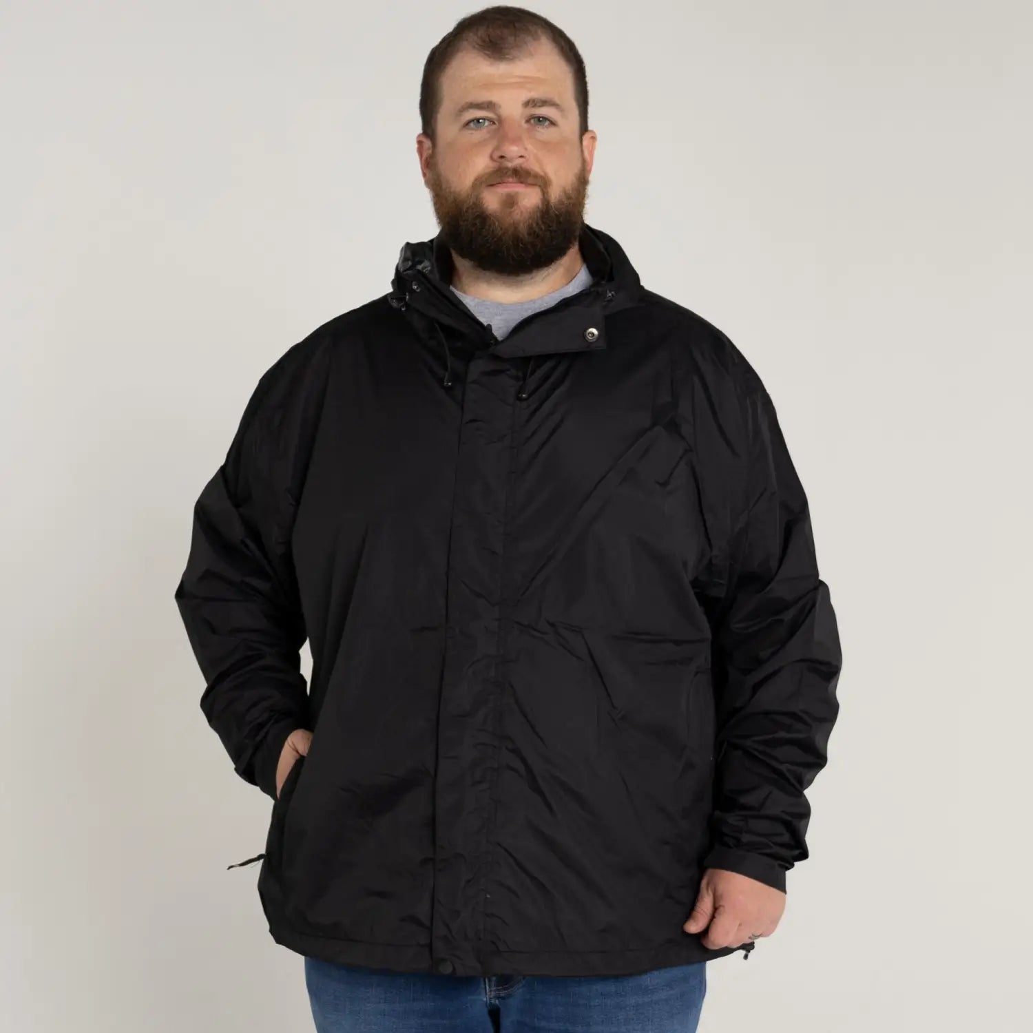 Black hooded jacket from Snow Country Outerwear Men’s packable rain windbreaker in big sizes