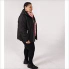 Woman in black winter coat from Women’s Plus Size Winter Down Alternative 3-in-1 Coat Jacket Snow Country Outerwear Alps