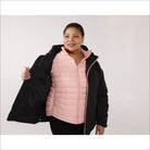 Woman wearing black jacket with pink vest in winter 3in1 coat snow country outerwear