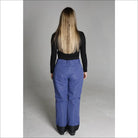 Woman wearing blue Snow Country Outerwear women’s ski pants for snowboarding