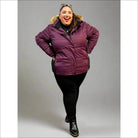 Woman wearing Maroon Snow Country Outerwear Womens Aspen Ski Jacket Coat outdoors