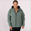 Woman wearing a hooded green plus size fleece soft shell jacket for spring or fall outerwear