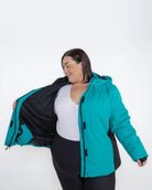 Open teal winter coat from Snow Country Outerwear Womens Aspen Ski Jacket Coat