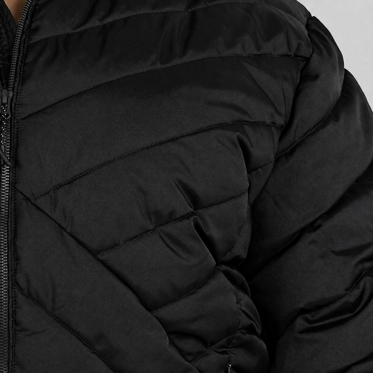 Black Axtell plus size parka, sizes 1X to 6X, chevron quilting and zip detail
